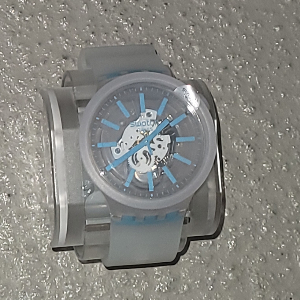 New Swatch Swiss Unisex Clear & Turquoise Watch